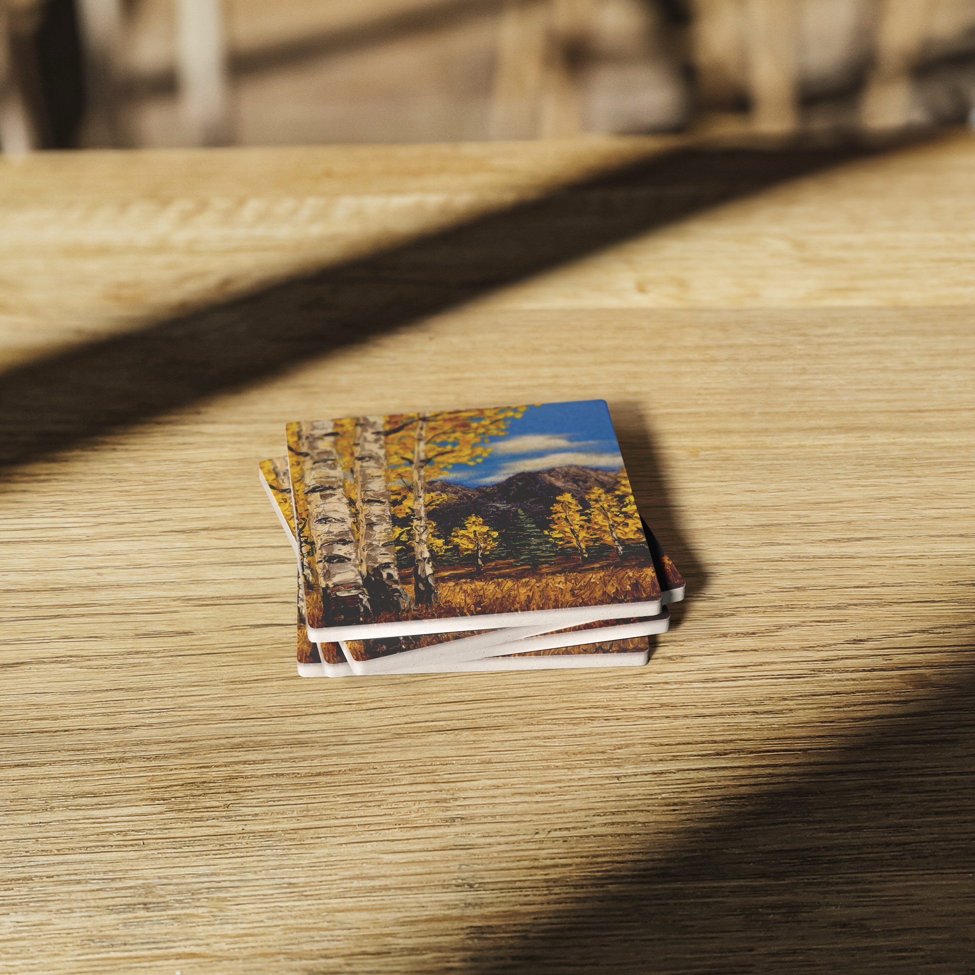 Aspen_Gold_Square_Stone_Coaster_SquareStoneCoaster_WoodTable_AS_Mockup.png